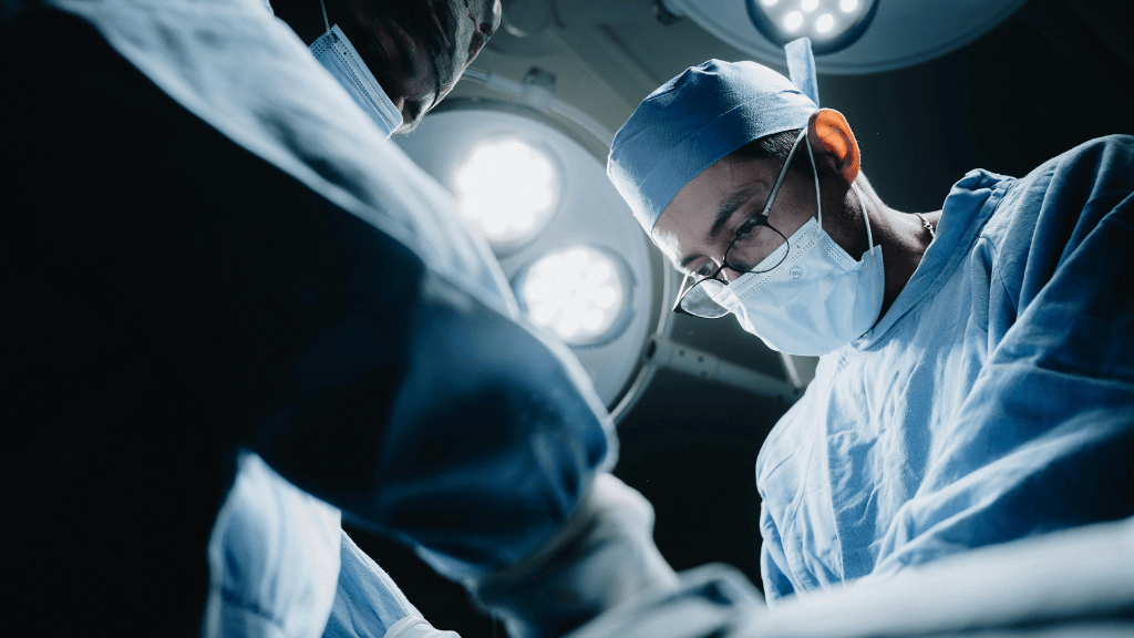 Urologist performing minimally invasive surgery