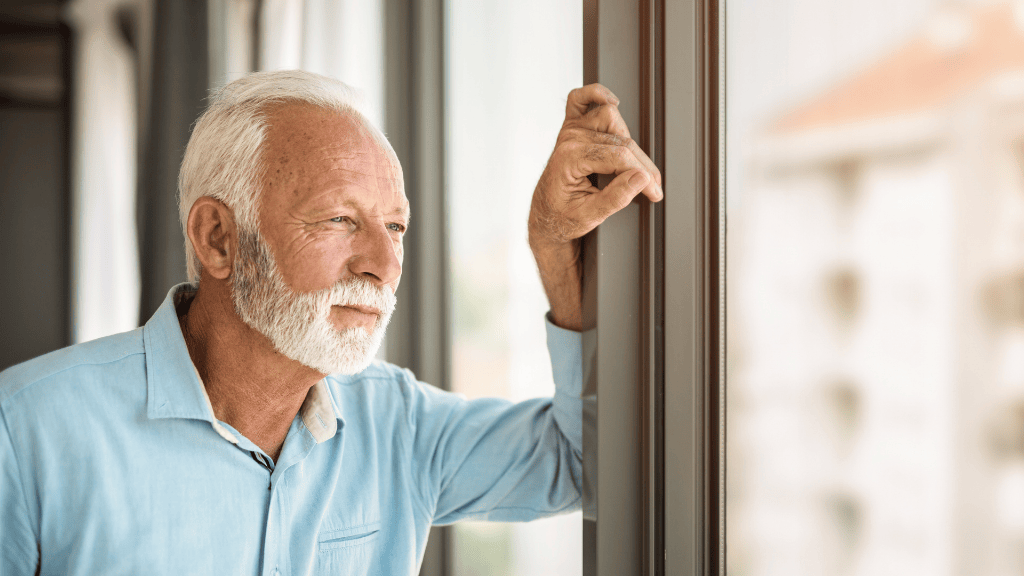 A thoughtful man contemplating which prostate cancer treatment, surgery or radiotherapy, is right for him.