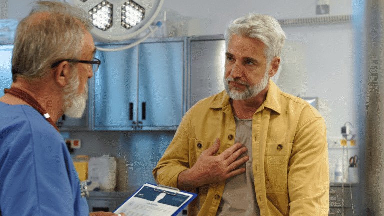 A senior patient discussing prostate cancer treatment options with a specialist