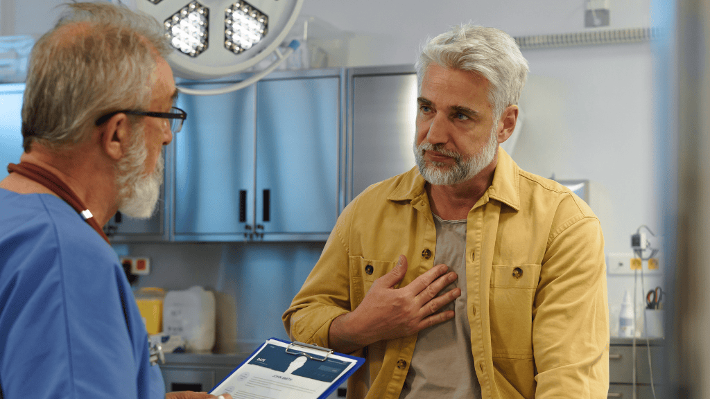 A senior patient discussing prostate cancer treatment options with a specialist